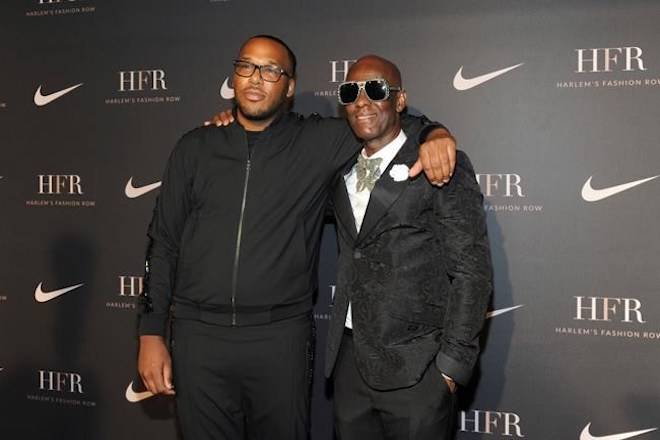 Honorees Jason Rembert, left, and Dapper Dan attend a fashion show and awards ceremony held by the Harlem Fashion Row collective and Nike before the start of New York Fashion Week, Tuesday, Sept. 4, 2018. (AP Photo/Diane Bondareff)