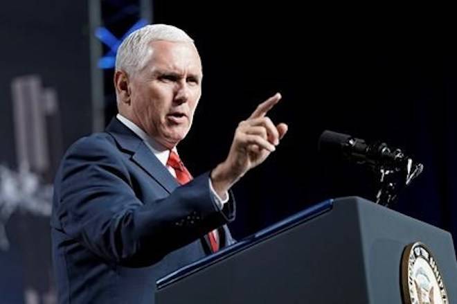 FILE - In this Aug. 23, 2018, file photo, Vice President Mike Pence speaks during a visit to NASA’s Johnson Space Center in Houston. (AP Photo/David J. Phillip, File)
