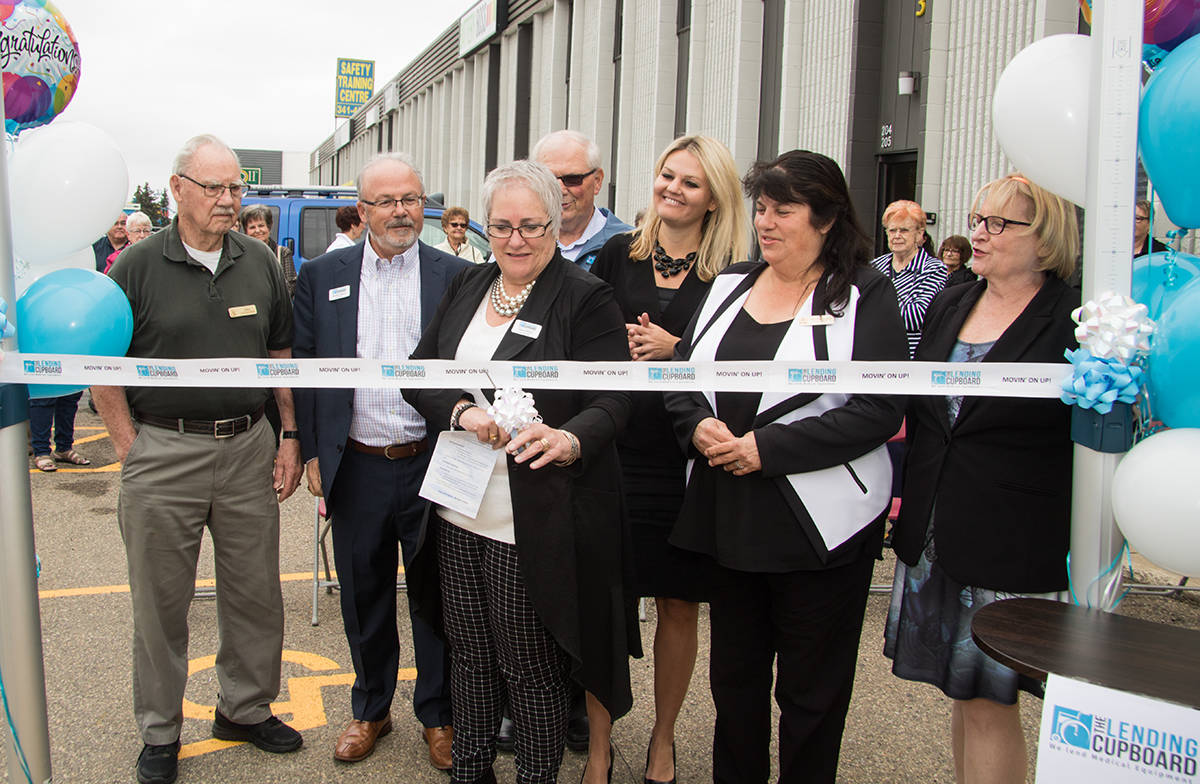 Executive Director of The Lending Cupboard Dawna Morey cut the ribbon to their new facility in north Red Deer on Sept. 10th. Todd Colin Vaughan/Red Deer Express