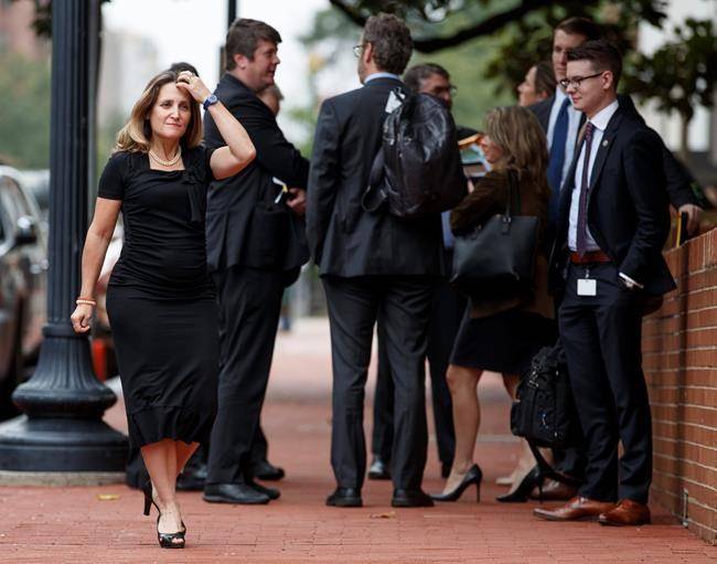 Canadian Foreign Affairs Minister Chrystia Freeland, left, arrives at the Office Of The United States Trade Representative, Tuesday, Sept. 11, 2018, in Washington. (AP Photo/Carolyn Kaster)