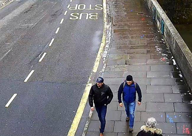 FILE In this file grab taken from CCTV and issued by the Metropolitan Police in London on Wednesday Sept. 5, 2018, Ruslan Boshirov and Alexander Petrov walk on Fisherton Road, Salisbury, England on March 4, 2018. (Metropolitan Police via AP, File)