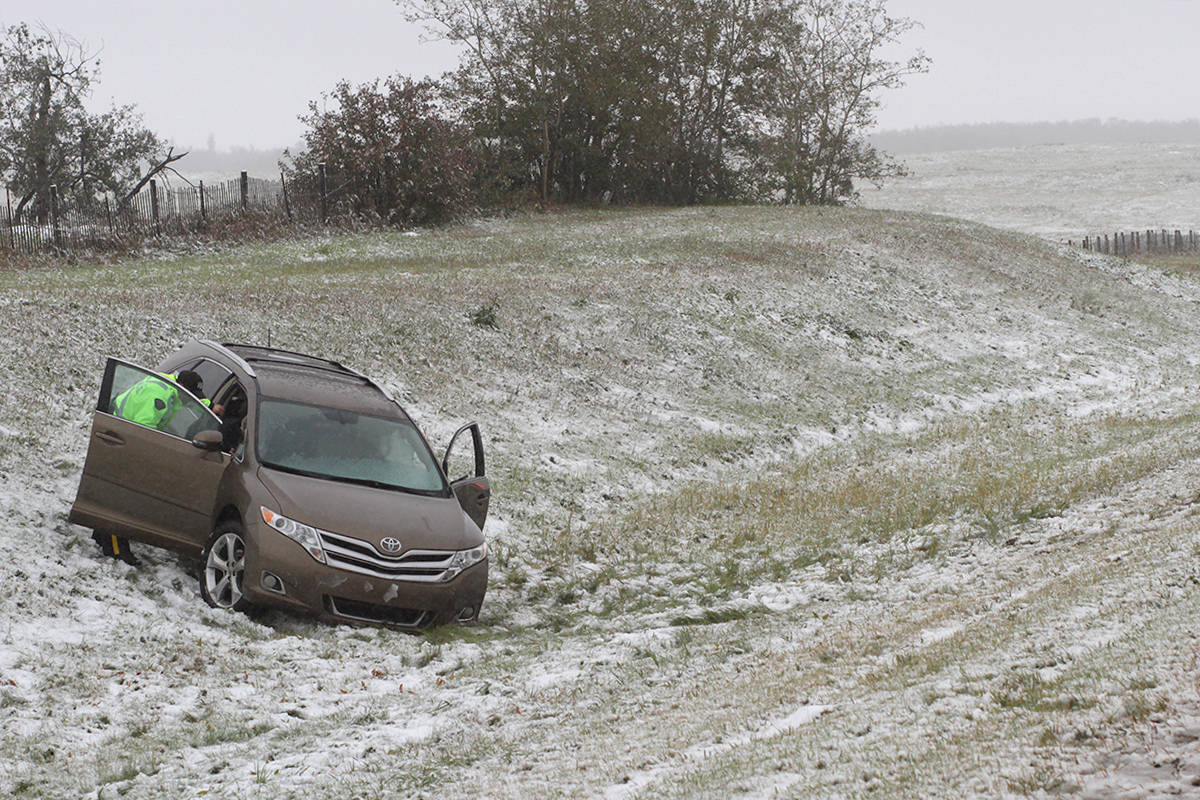 The injuries from a semi versus crossover SUV Saturday morning were minor considering somewhat wintry road conditions on Highway 2. Emergency crews, including EMS, the Ponoka Integrated Traffic Unit and the Ponoka County East District Fire Department were called to the scene.                                Photo by Jeffrey Heyden-Kaye