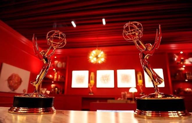FILE - In this Sept. 13, 2018 file photo, Emmy Award statuettes are displayed inside the Lindt Chocolate Lounge inside the Microsoft Theatre in Los Angeles. The 70th Emmy Awards will be held on Monday. (Photo by Chris Pizzello/Invision/AP, File)