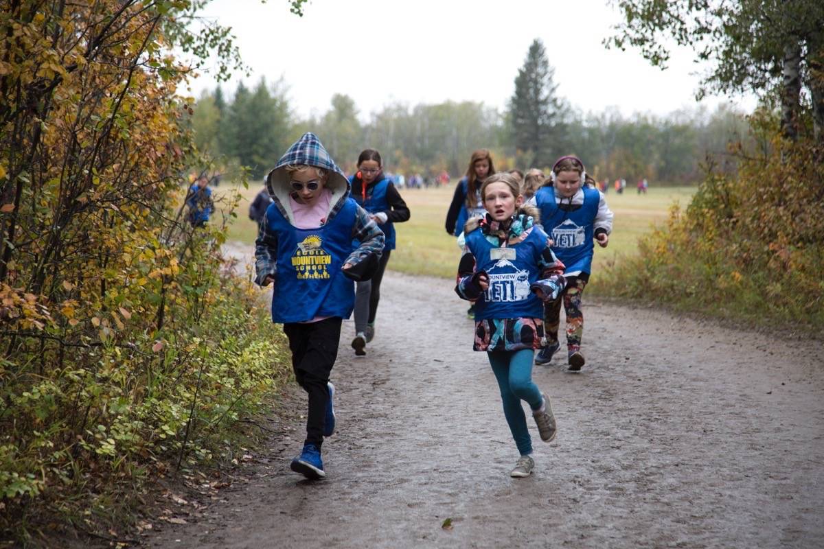 Mountview School students Hunter Foley, left, and Hudson Greenhaugh, take part in the Dawe Run on Tuesday morning. In its 40th year, the Dawe Run aims to promote fitness in youngsters and features almost 5,000 students from Grade four to 12. Robin Grant/Red Deer Express