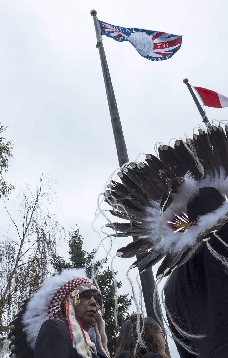 Chiefs’ eagle feathers make for a backdrop to the Treaty 6 flag, which stands aloft at the WCPS district office in Ponoka.