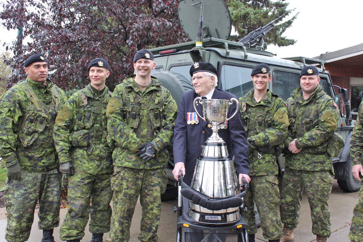 Tom Baker, a resident of West Park Retirement Lodge, had the opportunity to hold the Grey Cup as part of the second annual Operation Tea Cup. Carlie Connolly/Red Deer Express