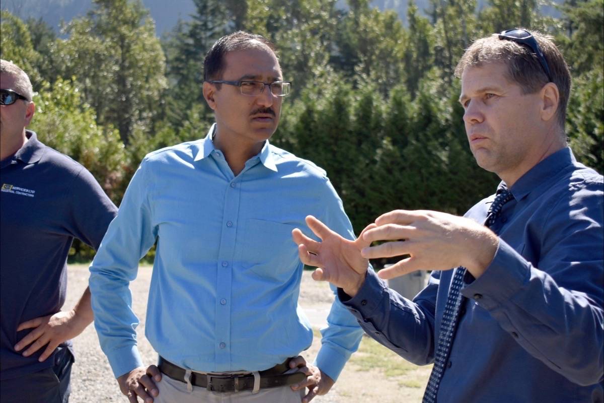 Rob Wall, consultant on Hope’s Pollution Control Centre, explains the second phase of the PCC to Amarjeet Sohi, federal Minister of Infrastructure and Communities, during a July 13 visit to the project. Emelie Peacock/Hope Standard