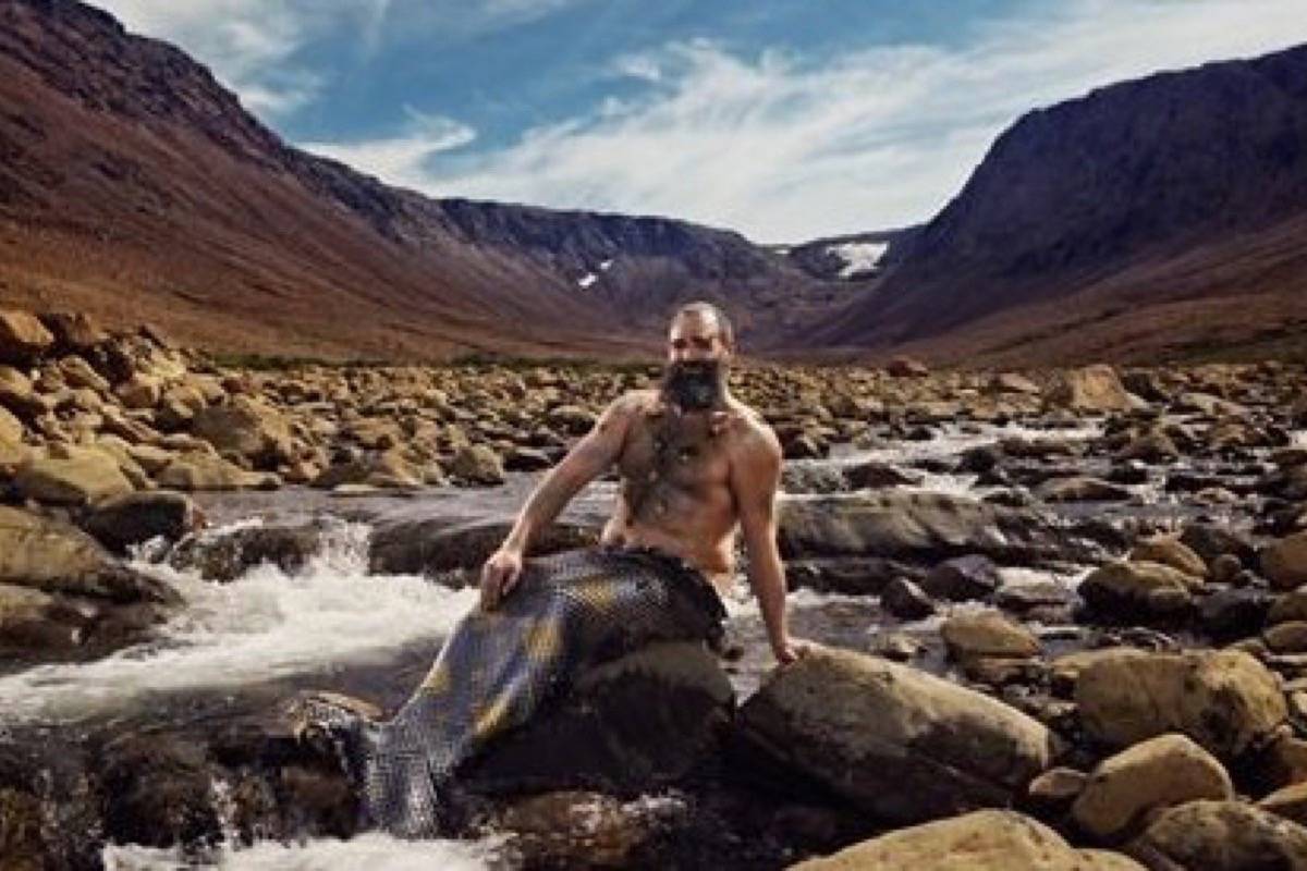 Ken Butler poses at Gros Morne’s iconic tablelands in an undated handout from the 2019 merb’ys calendar. (THE CANADIAN PRESS/HO-MerBys 2019, Roth and Ramberg)