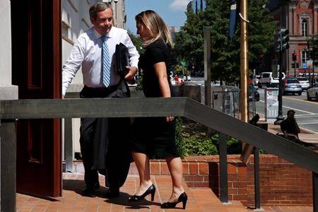 David MacNaughton, left, Canada’s Ambassador to the United States, opens the door for Canada’s Foreign Affairs Minister Chrystia Freeland after she spoke to the media about trade talks at the Office of the United States Trade Representative in Washington, Wednesday, Aug. 29, 2018. (THE CANADIAN PRESS/AP-Jacquelyn Martin)