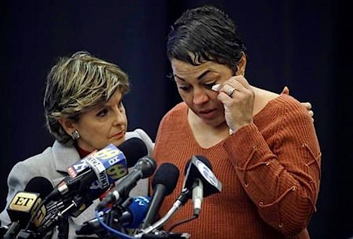 Attorney Gloria Allred, left, comforts Chelan Lasha as she speaks during a news conference, Tuesday, Sept. 25, 2018, in Norristown Pa., after Bill Cosby was sentenced to three-to 10-years for sexual assault. (AP Photo/Matt Rourke)