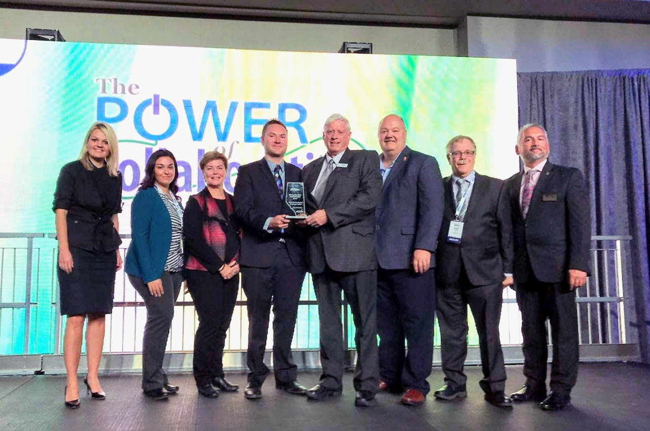 PHOTO CAPTION: (L-R) – City of Red Deer Mayor Tara Veer, Town of Blackfalds Councillor Marina Appel, Lacombe County Reeve Paula Law, NRDRWWSC CAO Matthew Goudy, NRDRWWSC Chair Ken Wigmore, City of Lacombe Mayor Grant Creasey, Town of Blackfalds Mayor Richard Poole, and AUMA President Barry Morishita with the 2018 AUMA Sustainability in Collaboration Award.