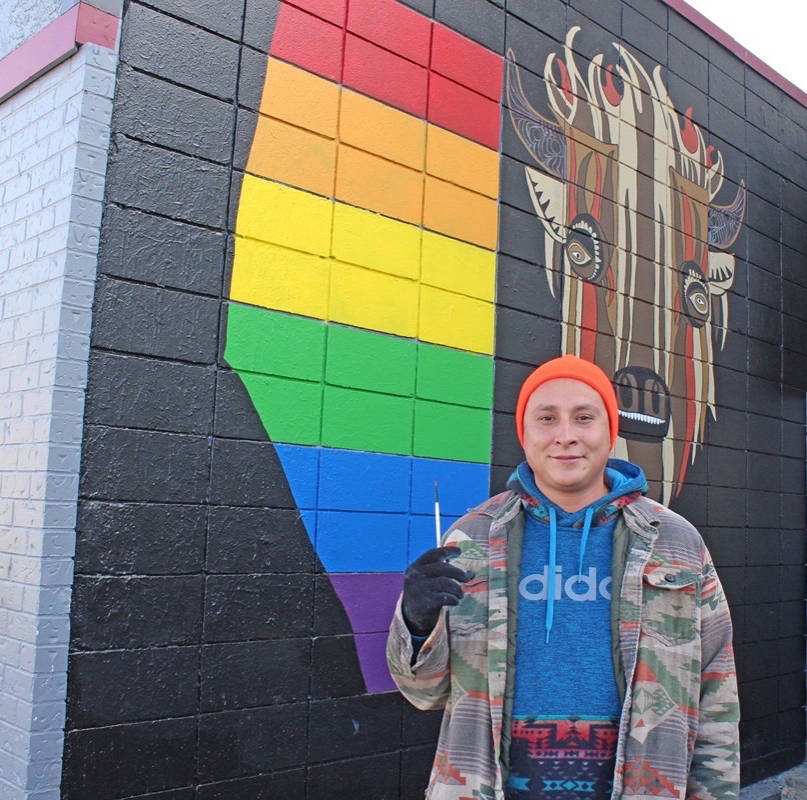 Ryan Jason Allen Willert stands by his recent mural at Turning Point. Carlie Connolly/Red Deer Express