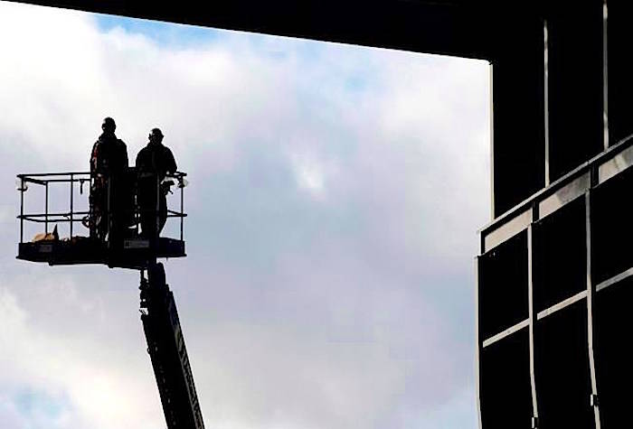 Workers are pictured at the Vancouver Shipyard in an October 7, 2013, file photo. Statistics Canada says the country gained 63,000 jobs in September, edging the unemployment rate lower to 5.9 per cent. THE CANADIAN PRESS/Jonathan Hayward