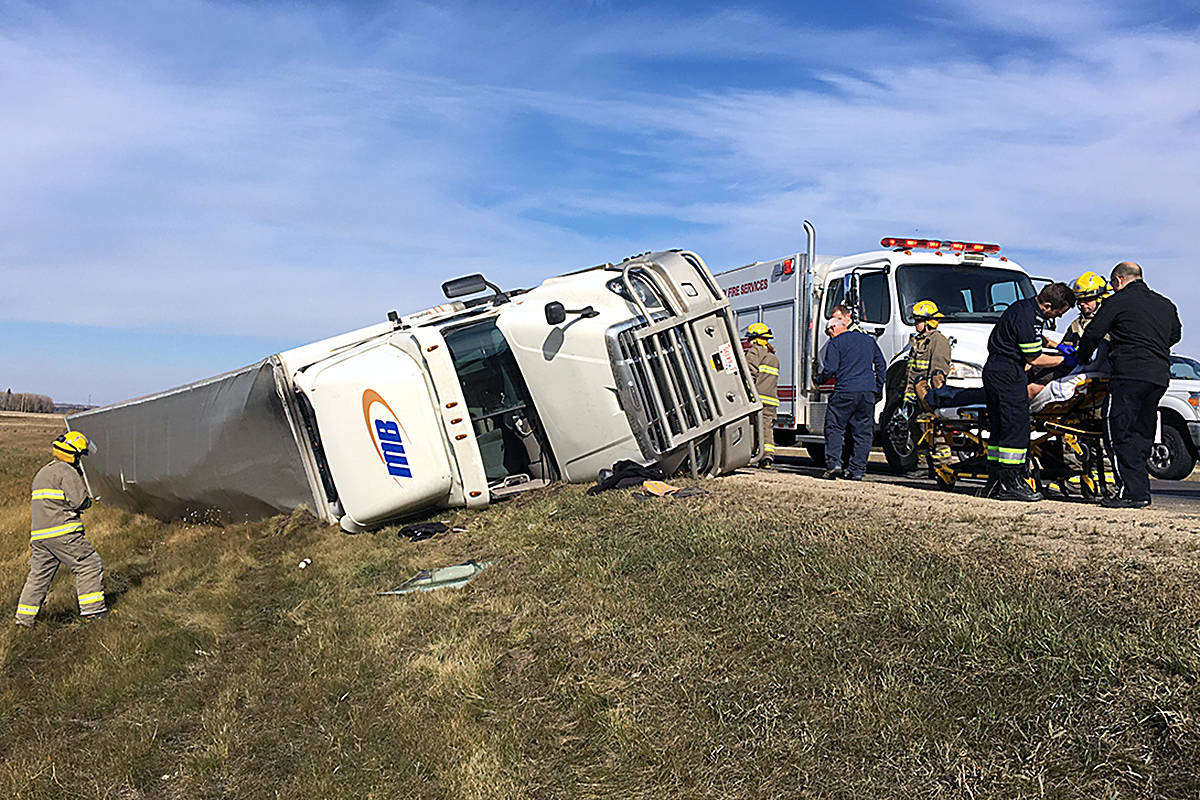 Hitting the ditch: Shortly before 2 p.m. Oct. 5, this semi-trailer unit flipped onto its side after hitting the west ditch in the southbound lanes of the Highway 2 just north of Morningside. Ponoka Integrated Traffic Unit members along with EMS and Ponoka County East District Fire units attended the scene. It isn’t know if the driver suffered any injuries and a cause of the incident is still being investigated. Travellers on the highway between Ponoka and Morningside should expect some delays as traffic is being restricted to one lane. Photo by Jeffrey Heyden-Kaye