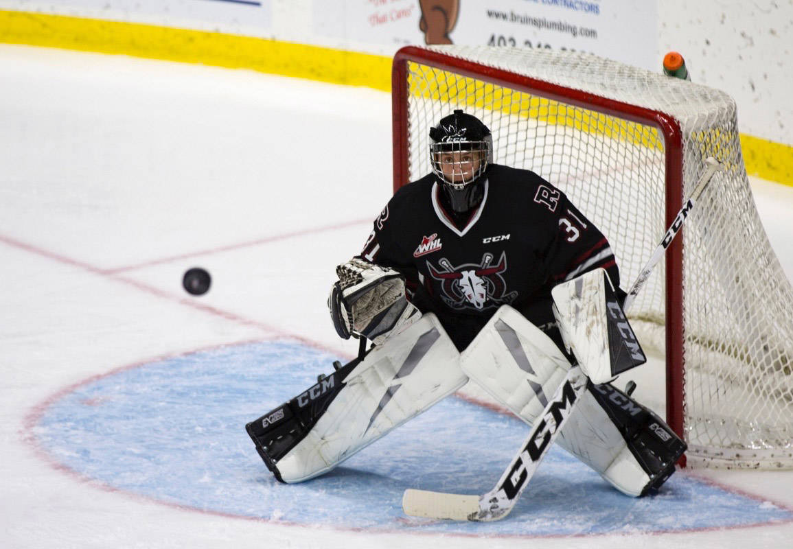 Red Deer Rebels Goalie Ethan Anders got the team out of some hot spots with several impressive saves against the unbeaten Prince Albert Raiders on Saturday night. Robin Grant/Red Deer Express