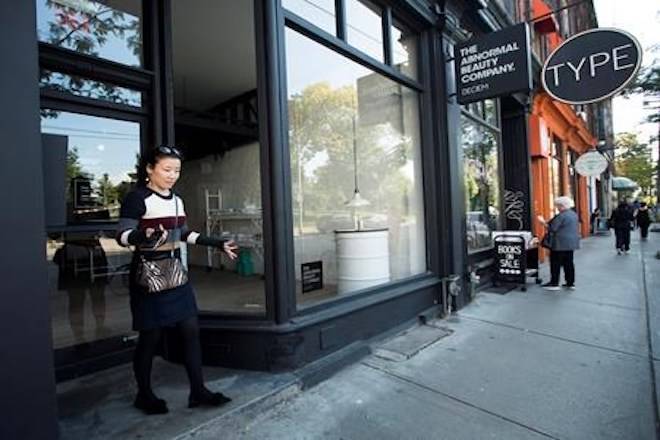 A women reacts outside the beauty supply store Deciem as it has closed all locations unexpectedly in Toronto on Tuesday, October 9, 2018. THE CANADIAN PRESS/Nathan Denette