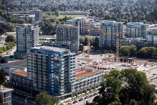 Condo towers are seen under construction in an aerial view, in Richmond, B.C., on Wednesday May 16, 2018. THE CANADIAN PRESS/Darryl Dyck