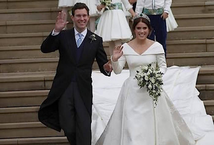 Princess Eugenie of York and Jack Brooksbank after their wedding ceremony at St George‚Äôs Chapel, Windsor Castle, near London, England, Friday Oct. 12, 2018. (Andrew Matthews, Pool via AP)