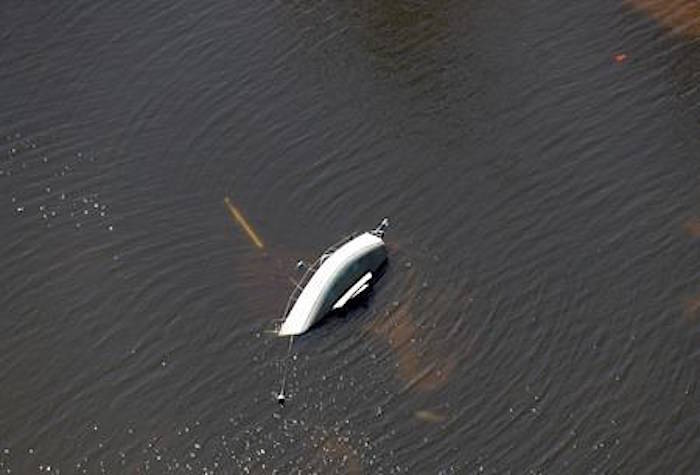 A sailboat upended by winds from Hurricane Michael is shown in this aerial photo Thursday, Oct. 11, 2018, in Mexico Beach, Fla. (AP Photo/Chris O’Meara)