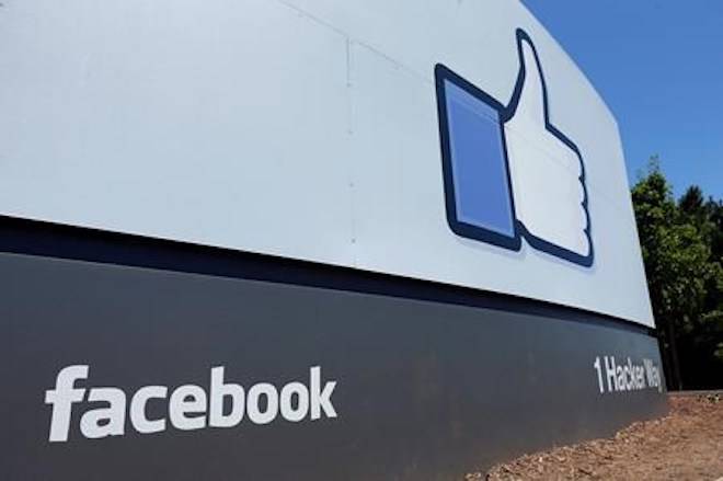 FILE - This July 16, 2013 file photo shows a sign at Facebook headquarters in Menlo Park, Calif. (AP Photo/Ben Margot, File)