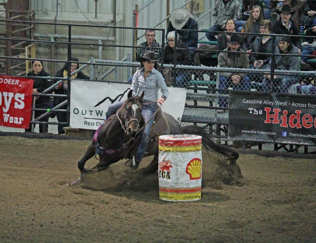 Joanne Long of Red Deer has speeds around a barrel in the ladies barrel racing at the Foothills Cowboys Association Cowboy Classic Finals Rodeo Friday night at Westerner Park. Carlie Connolly/Red Deer Express