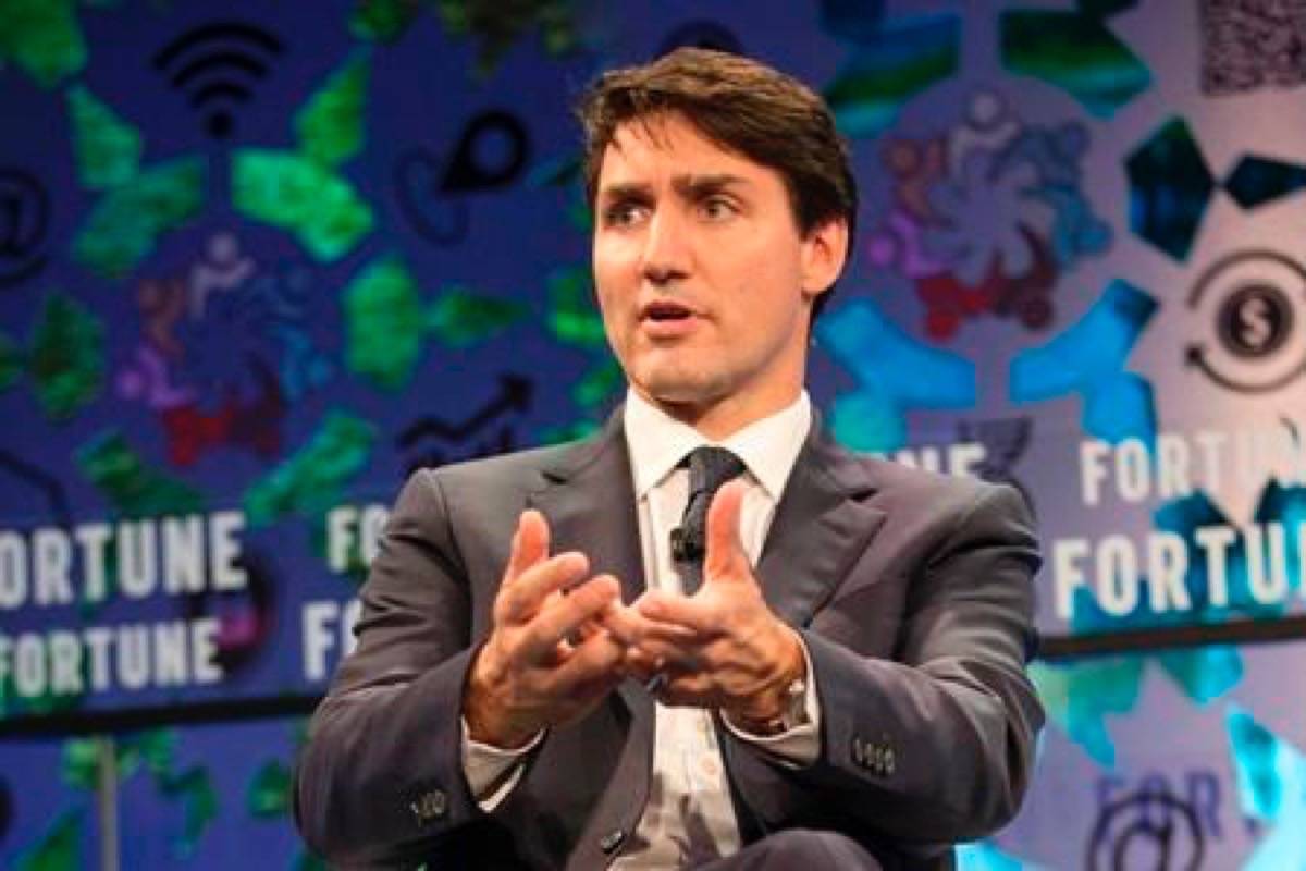 Prime Minister Justin Trudeau speaks at the Fortune Global Forum in Toronto on Monday, October 15, 2018. With just hours to go before pot is legal in Canada, Trudeau says Canadian parents should be talking to their kids about the drug. (Chris Young/The Canadian Press)