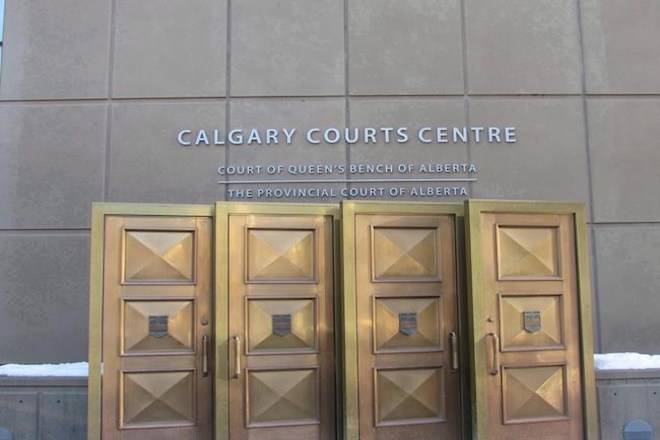 The sign at the Calgary Courts Centre in Calgary is shown on Friday, Jan. 5, 2018. THE CANADIAN PRESS/Bill Graveland