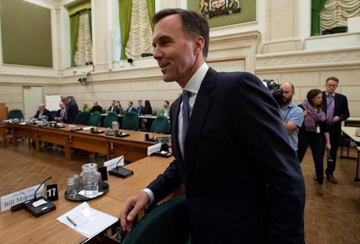 Finance Minister Bill Morneau arrives at the Standing Committee on International Trade on Parliament Hill in Ottawa, Tuesday October 16, 2018. THE CANADIAN PRESS/Adrian Wyld