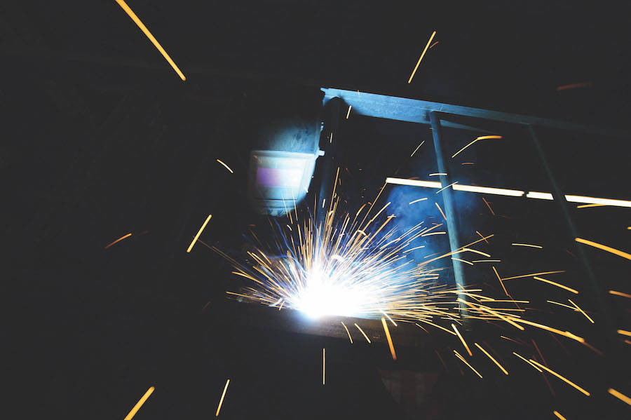 A welder fabricates a steel structure at an iron works facility in Ottawa on Monday, March 5, 2018. THE CANADIAN PRESS/Sean Kilpatrick