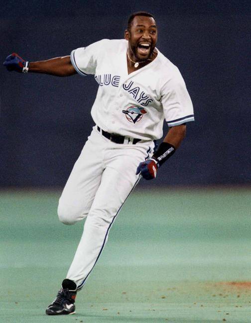 Toronto Blue Jays’ Joe Carter celebrates as he runs the bases after his game-winning three-run home run to win the World Series in this Oct.23, 1993 file photo at Skydome in Toronto. Even though he was in the home dugout at the time, former Toronto Blue Jays manager Cito Gaston didn’t see Carter hit his famous home run to win the 1993 World Series. (Hans Deryk/The Canadian Press)