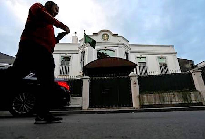 A man walks past Saudi Arabia’s consul general’s official residence in Istanbul, Wednesday, Oct. 24, 2018. (AP Photo/Lefteris Pitarakis)