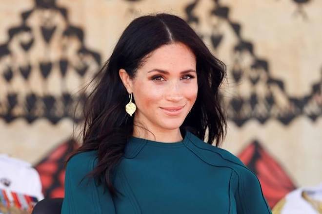 Meghan, Duchess of Sussex attend the unveiling of the Labalaba Statue in Nadi, Fiji, Thursday, Oct. 25, 2018. (Chris Jackson/Pool Photo via AP)