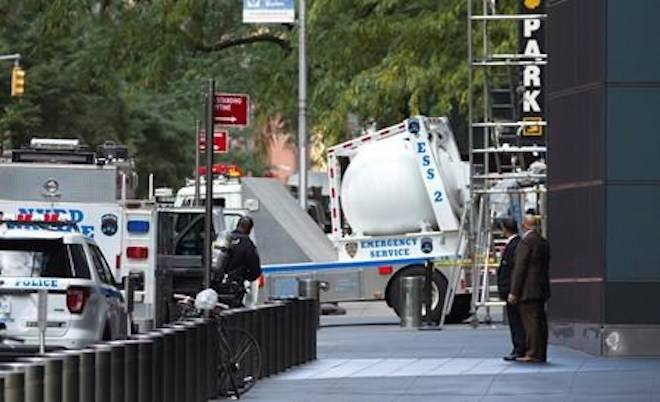 An NYPD bomb squad vehicle departs an area outside Time Warner Center on Wednesday, Oct. 24, 2018, in New York. (AP Photo/Kevin Hagen)