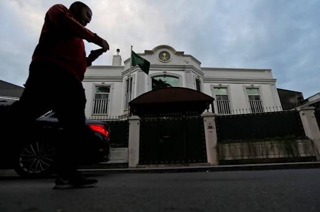 A man walks past Saudi Arabia’s consul general’s official residence in Istanbul, Wednesday, Oct. 24, 2018. (AP Photo/Lefteris Pitarakis)