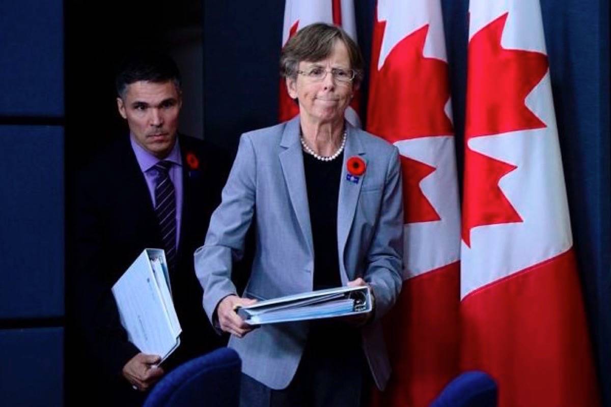 Transportation Safety Board of Canada board member Paul Dittmann and TSB Chair Kathy Fox arrive for a press conference to release Watchlist 2018 in Ottawa on Monday, Oct. 29, 2018. (THE CANADIAN PRESS/Sean Kilpatrick)