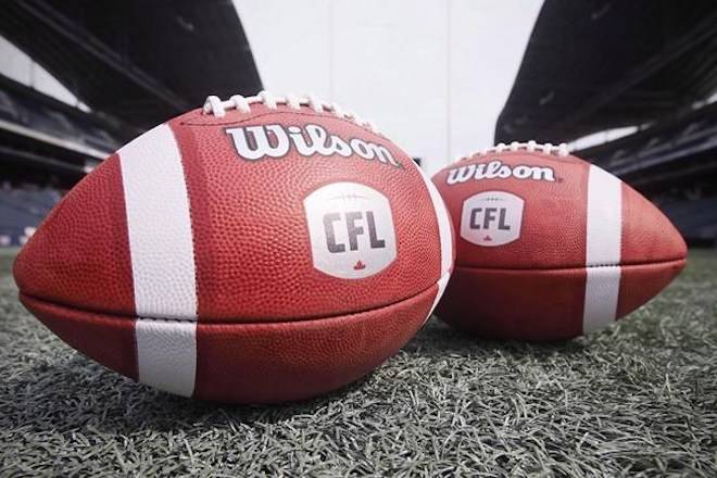 New CFL balls are photographed at the Winnipeg Blue Bombers stadium in Winnipeg, Thursday, May 24, 2018. THE CANADIAN PRESS/John Woods