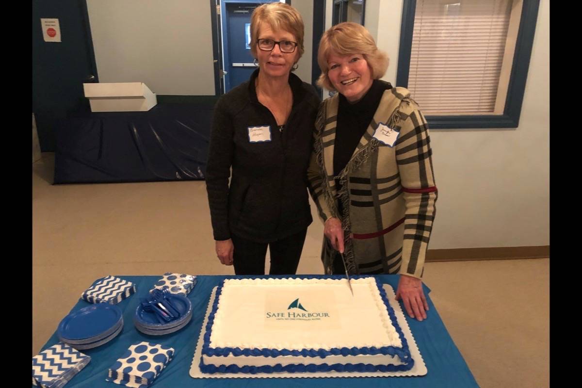 Director of Programs and Development at the Safe Harbour Society Brenda Hogan, left, and Manager of the Medically Supported Detox Centre Jennifer Cross cut the cake at the event celebrating the Safe Harbour Society’s first year of the medically supported detox centre. Robin Grant/Red Deer Express