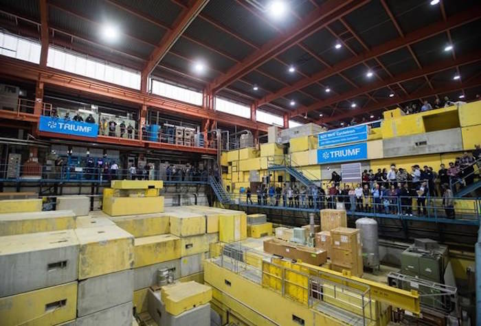 Staff and students wait for Prime Minister Justin Trudeau to arrive for a funding announcement at TRIUMF, CanadaÕs national particle accelerator owned and operated as a joint venture by a consortium of universities, at the University of British Columbia in Vancouver on Thursday November 1, 2018. THE CANADIAN PRESS/Darryl Dyck