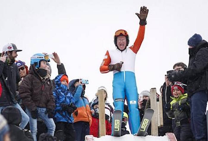 Michael Edwards, best known as “Eddie the Eagle,” prepares to start on the ski jump tower in Calgary on March 5, 2017, 29 years after competing in the 1988 Calgary Olympics. THE CANADIAN PRESS/Jeff McIntosh