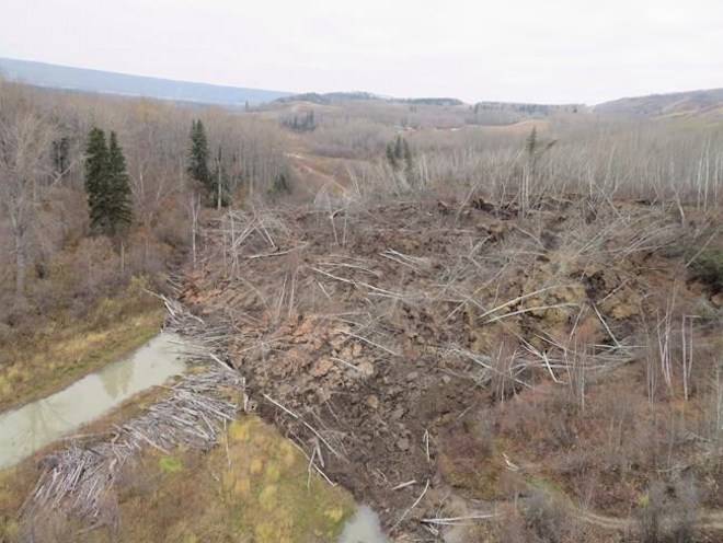 A slow moving landslide is seen inching down a hillside in northern British Columbia, prompting the evacuation of nearby Old Fort, B.C., in an undated handout photo. Marten Geertsema / THE CANADIAN PRESS