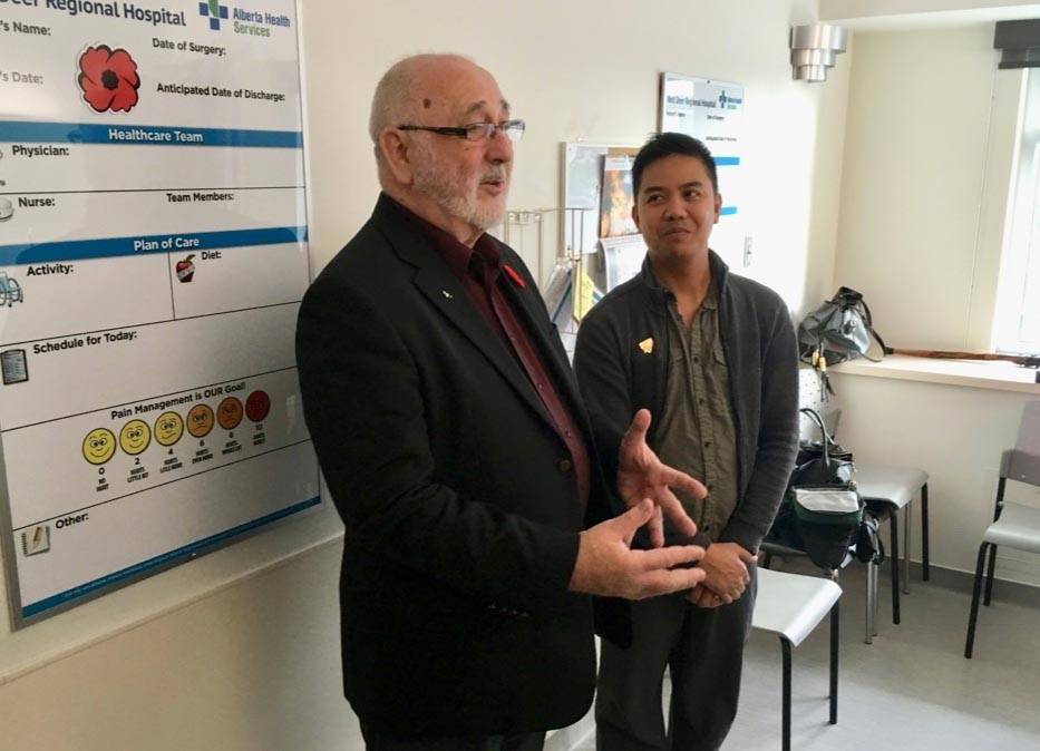 Veteran Allan Gooding was instrumental in helping create and launch the Veteran Recognition Program at the Red Deer Regional Hospital. He’s pictured here with John Dellacruz, a nurse at the hospital who helped care for him during his stay this past spring.                                Mark Weber/Red Deer Express