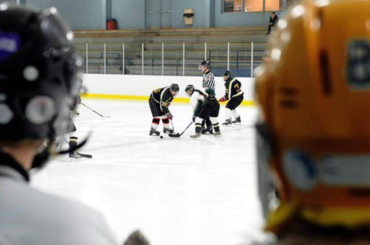 Students from John McCrea Secondary School play hockey at the Walter Baker Sports Centre in Ottawa on Thursday, January 19, 2012. Hockey groups across the country are looking for ways to manage runaway scores in a bid to keep the sport fun for kids. THE CANADIAN PRESS/Sean Kilpatrick