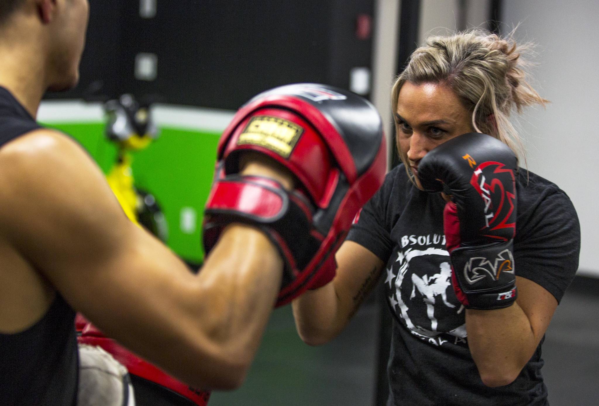 Muay Thai fighter Stephanie Schmale spars with her coach Will Quijada, co-owner of Absolute Fitness Red Deer. Schmale will be competing against Team USA for a North American title mid-November. Robin Grant/Red Deer Express                                Muay Thai fighter Stephanie Schmale spars with her coach Will Quijada, co-owner of Absolute Fitness Red Deer. Schmale will be competing against Team USA for a North American title Nov. 17th. Robin Grant/Red Deer Express
