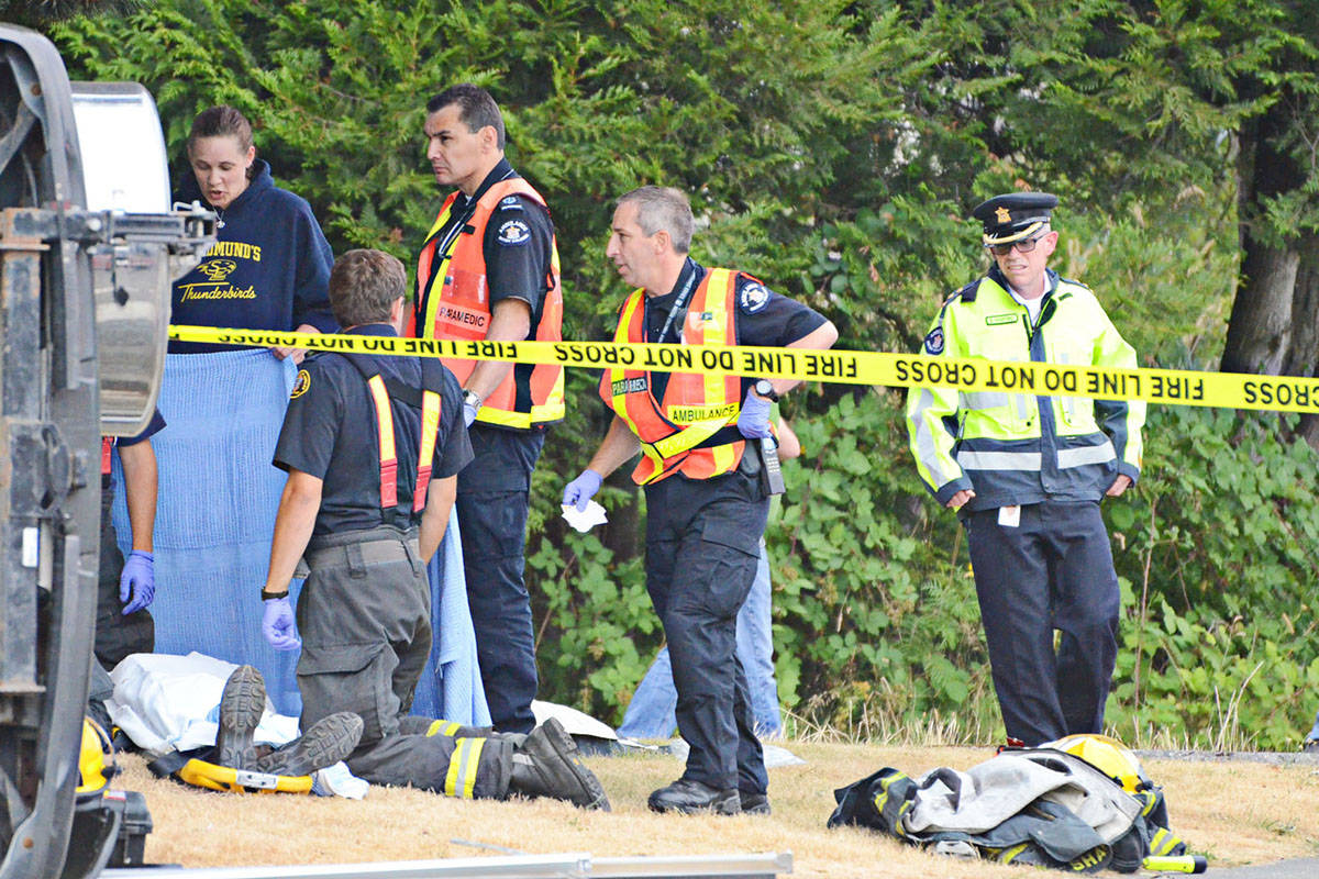 Emergency responders in 2014 responded to the collision between an RCMP cruiser and the van of a tourist family from Calgary. (Langley Advance files)