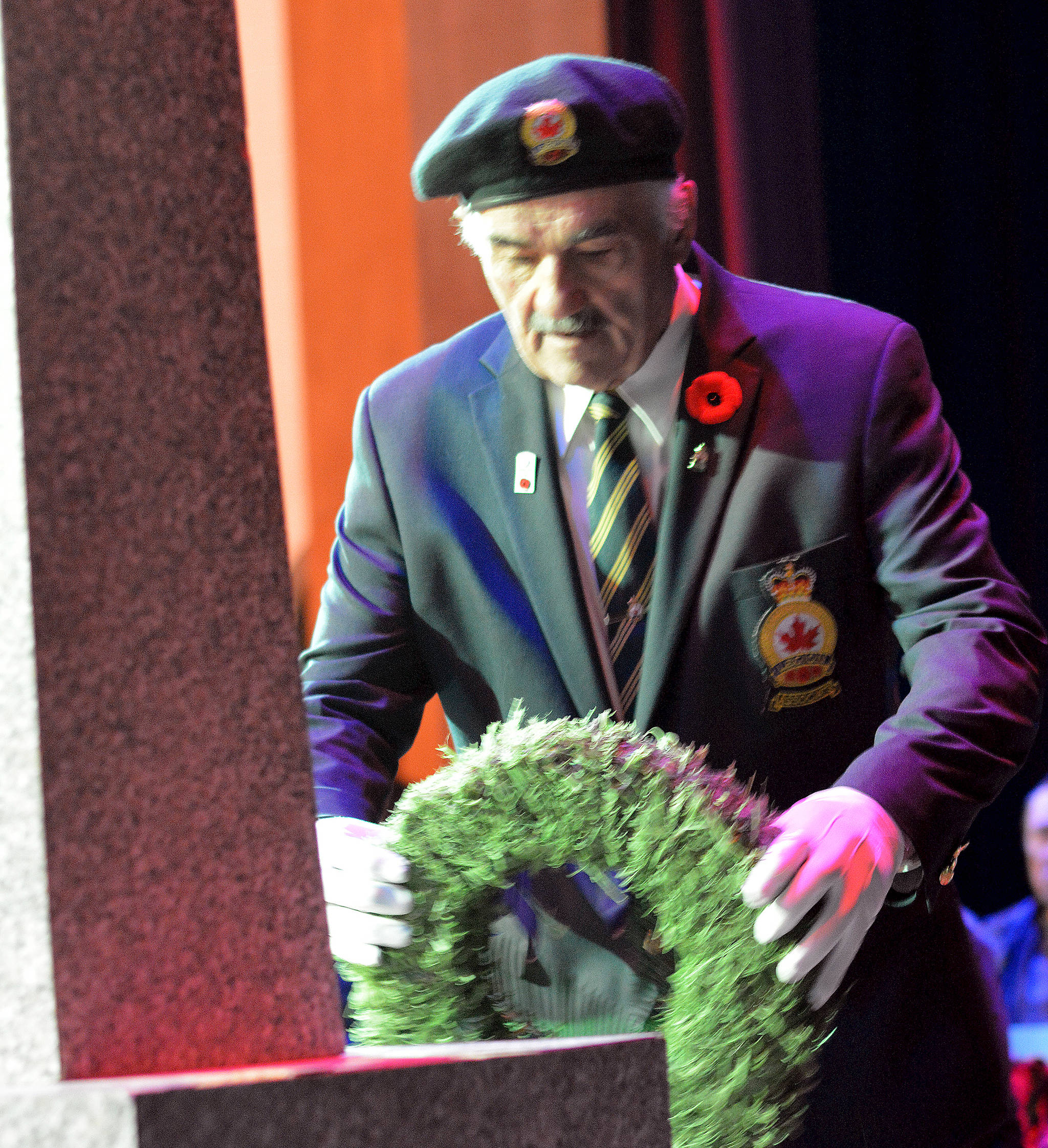 A veteran places a wreath during Stettler’s Remembrance Day Service. (Lisa Joy/Stettler Independent)