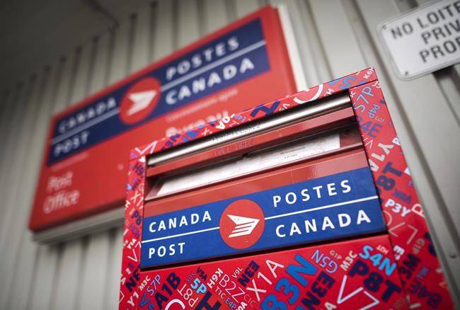 A mail box is seen outside a Canada Post office in Halifax. (THE CANADIAN PRESS/Darren Calabrese)