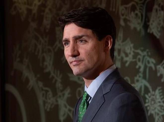 Prime Minister Justin Trudeau listens to a question during a media availability in Paris, France Monday November 12, 2018. THE CANADIAN PRESS/Adrian Wyld