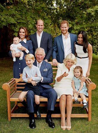 In this handout image provided by Clarence House and taken on Sept. 5, 2018, Britain’s Prince Charles poses for an official portrait to mark his 70th Birthday in the gardens of Clarence House, with Camilla, Duchess of Cornwall, Prince William, Kate, Duchess of Cambridge, Prince George, Princess Charlotte, Prince Louis, Prince Harry and Meghan, Duchess of Sussex, in London, England. (Chris Jackson/Pool Photo)