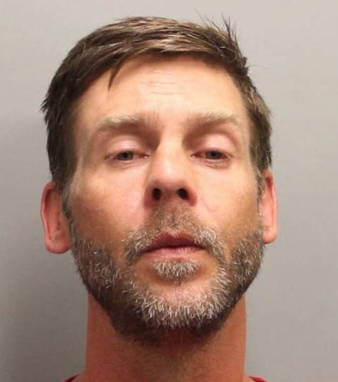 Sterling Miles Booker, 41, is wanted on a charge of criminal harassment and is currently charged with breaking and entering and causing bodily harm. (New Westminster Police Department)
