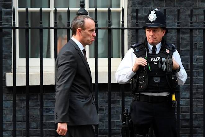 Britain’s Secretary of State for Exiting the European Union Dominic Raab, leaves after a cabinet meeting at 10 Downing Street in London, Tuesday, Nov. 13, 2018. (Victoria Jones/PA via AP)